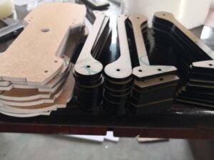 Laser Cut 5mm Thick Black PMMA as Weird Clock Parts